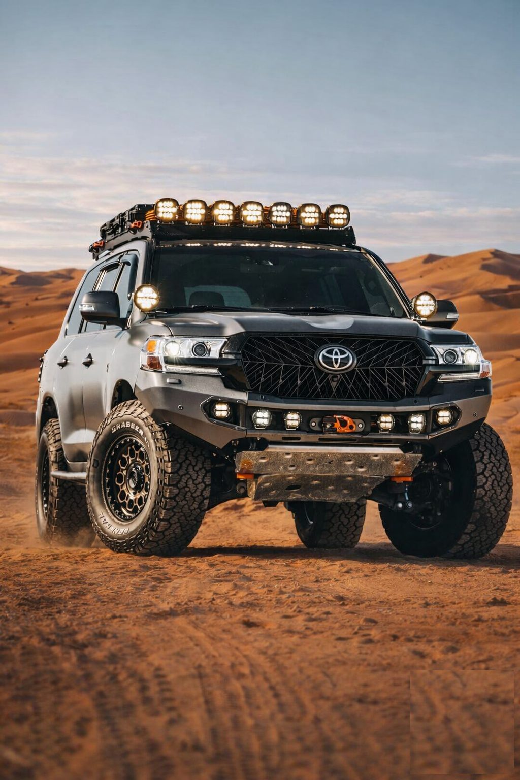 Toyota Land Cruiser 200 V8 stable at speed in red dunes