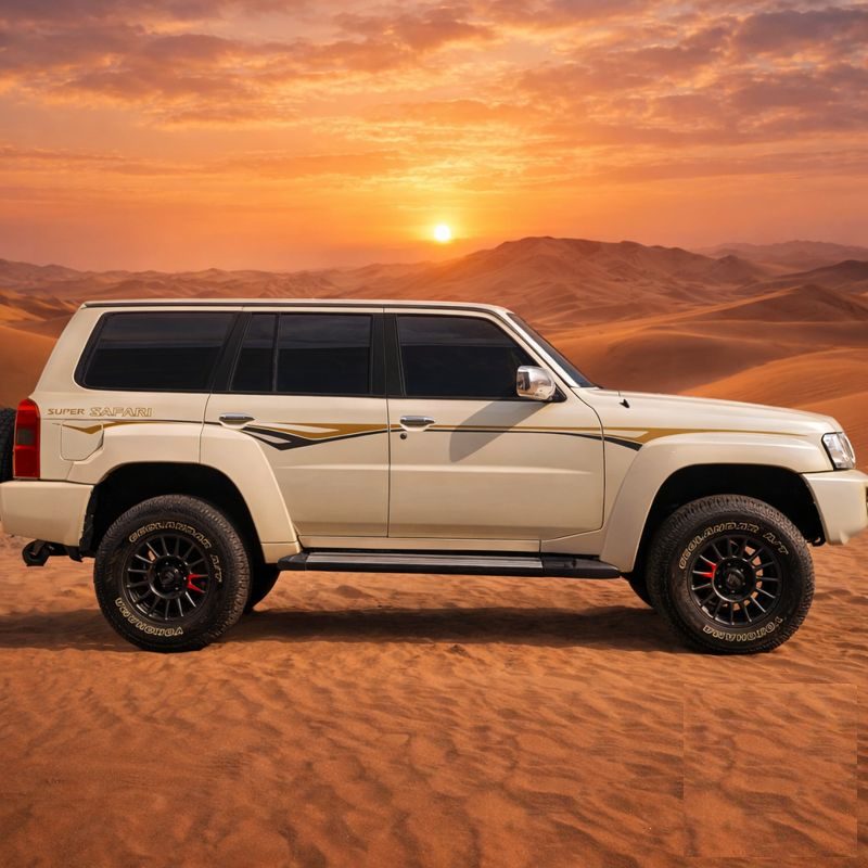 Nissan Patrol Y61 TB48 at rest on red dunes